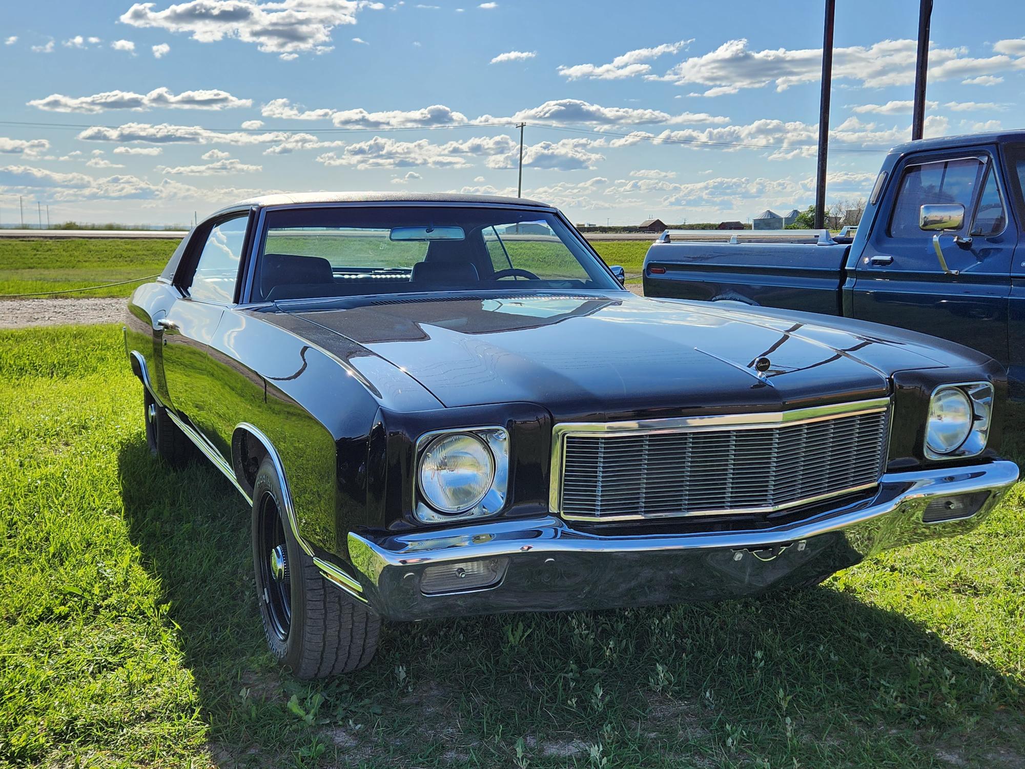 Chrome, cream, and a valve cover racing scene in Shaunavon